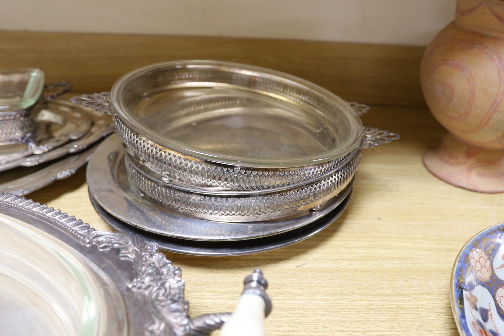 A quantity of various plated wares including a set of oval serving dishes and two-handled dishes